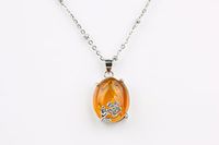 Silver Rose Incrustation Handmade Glass Essential Oil Diffuser Necklace (Amber)