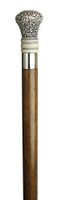 Walking Cane - Simulated antique scrimshaw Regency bulb handle-made of polymer resin. Walnut handle is set on 1" diameter hardwood which tapers to 3/4". The shaft is 36" long with rubber tip.