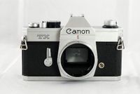 Canon TX SLR manual focus film camera body; no lens