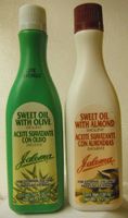 2 Botellas De Aceite. 1 De Olivo Y 1 De Almendras 4 Oz C/u