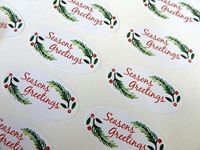 Pack of 48 Seasons Greetings Christmas Oval Stickers, Colourful Envelope Seals Labels for Cards, Festive Craft and Decoration