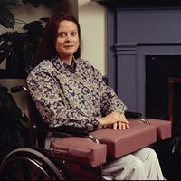 Lap Pillow with cutouts. 2" thick, fits standard 18" or 22" wheelchairs; color: blue
