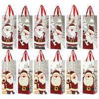 12-Pack Christmas Gift Wine Bags - Santa Claus-Themed Paper Bags with Satin Handles for Shopping, Alcohol Christmas Gifts, 4 Assorted Designs - 4 x 5 x 13.5 Inches