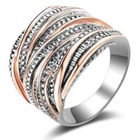 Mytys 2 Tone Wedding Band Rings Intertwined Crossover Statement Rings for Women Girl Rose Gold and Silver Plated