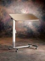 Overbed Table with Tilt-Top convenience for reading or drawing while in bed or wheelchair. Height adjustable with roll around castors