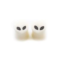 Pair of Ear Plugs Made of Organic Horn with Alien Design