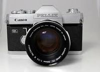 Canon Pellix 35mm SLR Film Camera with Canon Fl 35mm F2.5 Lens