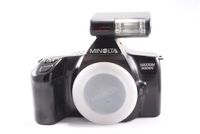 Minolta Maxxum 3000i slr camera body with Minolta flash