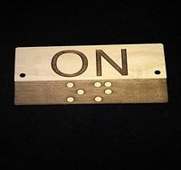 Braille ON Sign