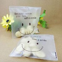 TraveT 50Pcs Smiley Face Candy Bags Self Adhesive Plastic Packing Bags DIY Candy Cookie Biscuits Bags for Home Wedding Party Gift Bag