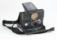 POLAROID SX-70 INSTANT FILM LAND CAMERA SE SONAR AUTO FOCUS ONE STEP WITH STRAP