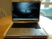 Dell Inspiron E1505 15.4-Inch Laptop (2.0 GHz T7200 Intel Core 2 Duo Processor, 2GB RAM, 120GB Hard Drive, ATI Mobility Radeon X1400 Video Card,8X DVD+/-RW Drive, 802.11b/g WiFi, Windows 7 Professional SP1)