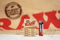 Bundle - 6 Items - 5 Packs(21 Tips Per Pack) Of AUTHENTIC Raw Rolling Paper Pre-Rolled Tips And Patriot Lighter
