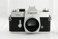 Canon TX SLR manual focus film camera body; no lens