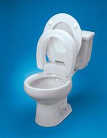 Maddak Inc. (a) Raised Toilet Seat Standard Hinged