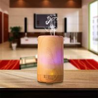 100 ml USB mini essential oil aroma diffuser, automatic off safety switch - 7 color LED lights and 4 timer settings suitable for home office car travel aroma diffuser (Wood grain)