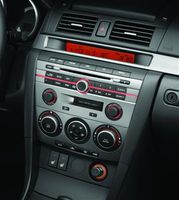 Genuine Mazda BS3F-79-BGX CD/MP3 Changer Trim Panel