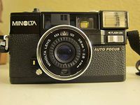 Minolta Hi-Matic AF2 Auto Focus 35mm Film Flash Camera w/ Minolta Lens 38mm 1:2.8 (46mm)
