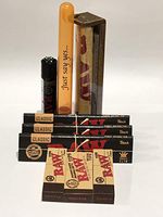 Raw Black King Size Rolling Paper (3 Packs) Raw Original Tips (2 Packs) Raw Wide Tips (1 Pack) Plus Raw Roller 110MM, Raw Black Clipper and Large DoobTube.
