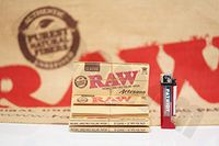 Bundle - 4 Items - 3 Packs (32 Leaves 32 Tips Per Pack) Of AUTHENTIC Raw Rolling Paper Artesano King Size Slim And Patriot Lighter