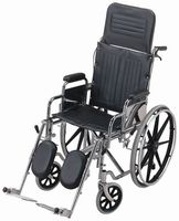 Wheel Chair - Folding reclining wheel chair with removable desk arms and removable head rest. Elevating swing away legs, heel loop and 24" mag wheels with solid tires. Black leatherette seat upholstery. Attendee operated. Available in 18" wide.