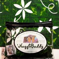 'NUGGLEBUDDY Microwaveable Moist Heat & Aromatherapy Organic Rice Pack. Cold Pack."Tahitian Gardenia" Fabric. This product is UNSCENTED.