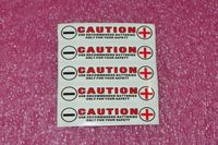 Battery tray polarity stickers