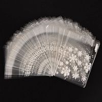AKOAK 100 Count Resealable Clear Snowflake Bags Sweets Cookies Lollipops Cake Cellophane Bags Packaging Candy Cookie Plastic Bag Wedding Birthday Chrismas Parties (14cm x 14cm +3cm)
