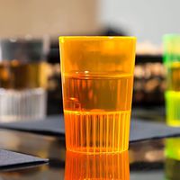 Fineline Quenchers 4110-ORG 1 oz. Neon Orange Hard Plastic Shooter Glass - 500/Case