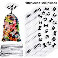 Maitys 100 Pieces Paw Bone Print Treat Bags Cellophane Clear Food Bags with 200 Pieces Twist Ties for Candies Chocolate Cookies Dessert Snacks (Black)