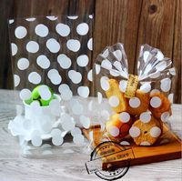 100 Pack White Polka Dot Candy Bags with 100Pcs Gold Metallic Twist Ties, Clear Plastic Treat Bags for Cookie Candy Snack Gift Wrapping Party Favor - 5.1'' by 8.2'' by 1.5''