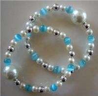 Queasy Beads® ~ Two (2) Authentic Stylish Motion Sickness Anti Nausea Acupressure Bracelets in Delicate Turquoise ~ Genuine, High Quality Turquoise Blue Cat's Eye, White and Sterling Silver Beads