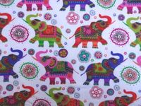 'NUGGLEBUDDY NEW! Microwavable Moist Heat & Aromatherapy Organic Rice Pack. Beautiful IVORY ELEPHANT Fabric with SWEET LAVENDER Aromatherapy!