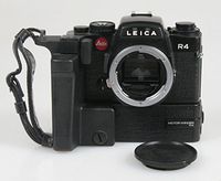 LEICA R4 BODY & WINDER W/BODY CAP. SHUTTER FIRES AT ALL SPEEDS