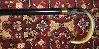 Walking Cane-Flat nose. This walking stick cane has an imported genuine horn handle. This walking aid has a black ebony tapered shaft. This horn handle cane has a weight capacity of 250 pounds and 36 inch shaft