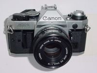 Canon AE-1 Program 35mm Manual Focus Film Camera - Lens - Flash Combo