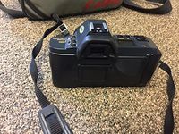 Canon T70 Film Camera With A Standard 50mm f/1.8 FD Lens