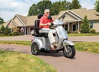 Pride Mobility Raptor 3 wheel mobility recreational scooter, range of 31 miles - 40 lb. capacity