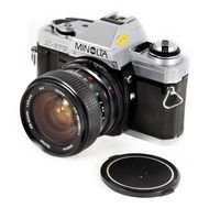 Minolta X370 35mm Manual SLR film camera, Vivitar 28-50mm f/3.5-4.5 MD lens with Batteries - Excellent Student Camera