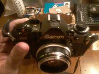 Black Canon A-1 SLR 35mm manual focus camera; body only, lens is not included