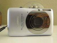 Canon PowerShot SD1300 IS 12.1 MP Digital Camera with 4x Wide Angle Optical Image Stabilized Zoom and 2.7-Inch LCD (Silver BUNDLE)