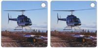 3dRose A helicopter delivers barrels of fuel - Key Chains, 2.25 x 4.5 inches, set of 2 (kc_11350_1)