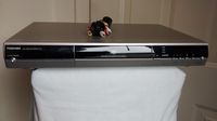 Toshiba D-R5 DVR/DVD Video Recorder. DVD-RAM/DVD-R/DVD-RW Recording. 1080i/720p/480 Upconverting w/ HDMI, Progressive Scan, DIVX, Dolby Digital Recording, Compact Disc Digital Audio. REMOTE INCLUDED.