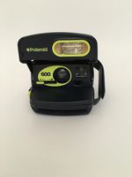 Blue Polaroid 600 Instant Film Camera With Built-in Flash