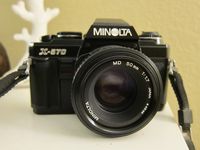 Minolta X-570 SLR Camera With A 50mm f/1.7 Lens