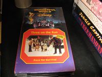 The Wonderful World of Disney: Three on the Run / Race for Survival [VHS Tape]