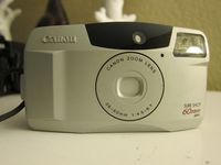 Canon Sure Shot 60 Zoom DATE SAF 35mm Film Camera w/Canon Zoom Lens 38-60mm 1:4.5-6.7 Camera (Grey/Black Color)