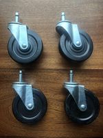Set of 4 Swivel Casters with Hard Rubber 4" x 1" Wheel with 7/16" Grip Ring Stem