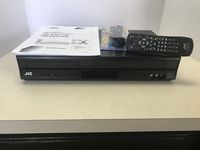 JVC HR-XVC11B DVD/VCR Video Cassette Recorder / DVD Player COMBO. 4-Head Hi-Fi Stereo VHS/CD/Video CD/DVD Player. Dolby Digital Sound. Energy Star Rated. AV Cable Included. No Remote.