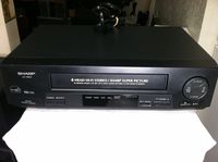Sharp VC-H810 VCR Video Cassette Recorder 4-Head Hi-Fi Stereo VHS Player. VHS HQ. Sharp Super Picture. Works Great. Energy Saver Star Rated Device.